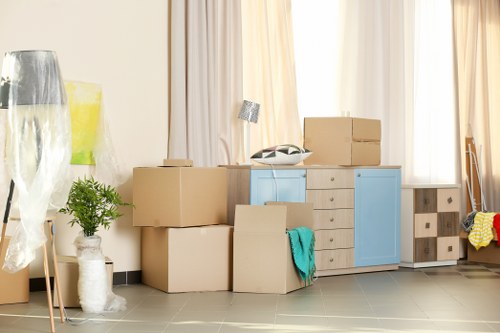 Office move process with labelled items ready for transport