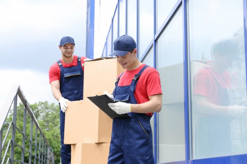 Customer raising a complaint about a removal service in a professional office setting
