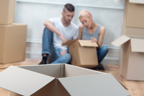 Removalists loading household items for transport in Enfield