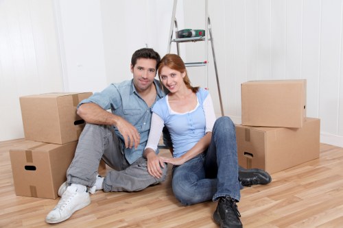Packed boxes and furniture ready for a van move in Enfield