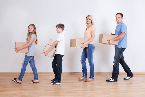 Enfield Removals team working safely with packed items and equipment