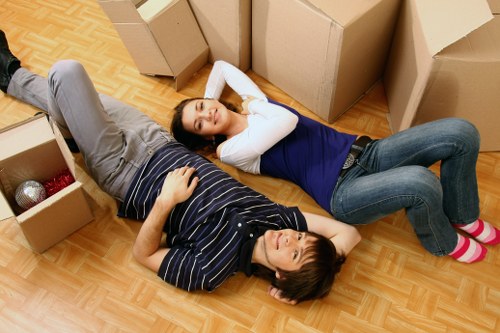 Local team collecting sofas and household furniture in Enfield